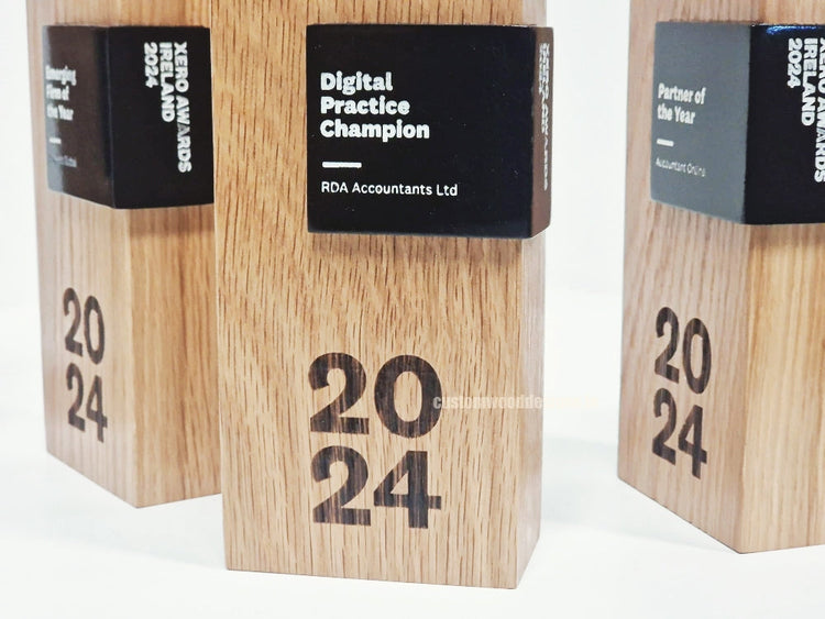 Engraved oak wooden award with company logo