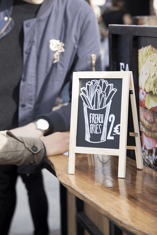 Wooden A5 chalkboard with engraved logo for bar promos